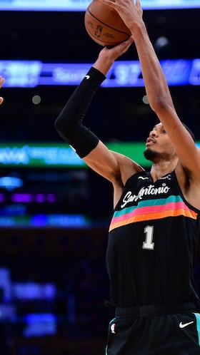 Feb 10, 2026; Los Angeles, California, USA; San Antonio Spurs forward Victor Wembanyama (1) shoots against Los Angeles Lakers forward Jarred Vanderbilt (2) during the first half at Crypto.com Arena. Mandatory Credit: Gary A. Vasquez-Imagn Images