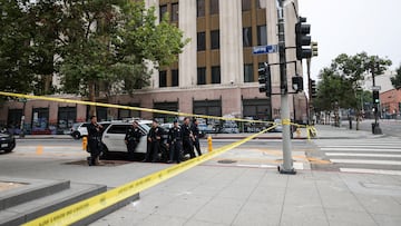 Members of law enforcement stand next to a police car, after days of protests against federal immigration sweeps and the deployment of the California National Guard and U.S. Marines, in downtown Los Angeles, California, U.S., June 11, 2025. REUTERS/Aude Guerrucci