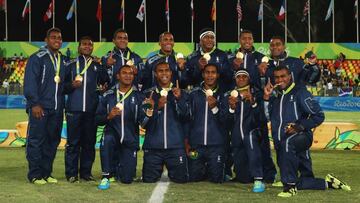 RIO DE JANEIRO, BRAZIL - AUGUST 11:  Gold medalists Fiji pose during the medal ceremony for the Men&#039;s Rugby Sevens on Day 6 of the Rio 2016 Olympics at Deodoro Stadium on August 11, 2016 in Rio de Janeiro, Brazil.  (Photo by Mark Kolbe/Getty Images)