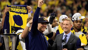 INDIANAPOLIS, INDIANA - DECEMBER 02: Head coach Jim Harbaugh of the Michigan Wolverines celebrates after a winning the Big Ten Championship over the Iowa Hawkeyes at Lucas Oil Stadium on December 02, 2023 in Indianapolis, Indiana.   Justin Casterline/Getty Images/AFP (Photo by Justin Casterline / GETTY IMAGES NORTH AMERICA / Getty Images via AFP)