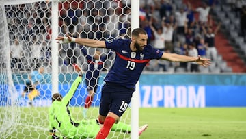 (FILES) In this file photo taken on June 15, 2021, France's forward Karim Benzema celebrates after scoring, before it was later revoked due to offside, during the UEFA EURO 2020 Group F football match between France and Germany at the Allianz Arena in Munich. - On December 19, 2022, Ballon D'Or winner Karim Benzema announced he was ending his international career, the day after France lost in the World Cup final to Argentina. (Photo by FRANCK FIFE / POOL / AFP)