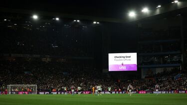 Soccer Football - Premier League - Aston Villa v Liverpool - Villa Park, Birmingham, Britain - May 13, 2024 General view as a big screen displays a pending VAR decision before a goal scored by Aston Villa's Ollie Watkins is disallowed Action Images via Reuters/Andrew Boyers EDITORIAL USE ONLY. NO USE WITH UNAUTHORIZED AUDIO, VIDEO, DATA, FIXTURE LISTS, CLUB/LEAGUE LOGOS OR 'LIVE' SERVICES. ONLINE IN-MATCH USE LIMITED TO 120 IMAGES, NO VIDEO EMULATION. NO USE IN BETTING, GAMES OR SINGLE CLUB/LEAGUE/PLAYER PUBLICATIONS. PLEASE CONTACT YOUR ACCOUNT REPRESENTATIVE FOR FURTHER DETAILS..