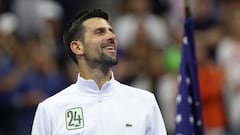 NEW YORK, NEW YORK - SEPTEMBER 10: Novak Djokovic of Serbia wears a jacket with 24 to celebrate winning his 24th Grand Slam after defeating Daniil Medvedev of Russia during their Men's Singles Final match on Day Fourteen of the 2023 US Open at the USTA Billie Jean King National Tennis Center on September 10, 2023 in the Flushing neighborhood of the Queens borough of New York City.   Clive Brunskill/Getty Images/AFP (Photo by CLIVE BRUNSKILL / GETTY IMAGES NORTH AMERICA / Getty Images via AFP)