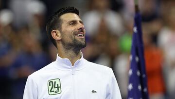 NEW YORK, NEW YORK - SEPTEMBER 10: Novak Djokovic of Serbia wears a jacket with 24 to celebrate winning his 24th Grand Slam after defeating Daniil Medvedev of Russia during their Men's Singles Final match on Day Fourteen of the 2023 US Open at the USTA Billie Jean King National Tennis Center on September 10, 2023 in the Flushing neighborhood of the Queens borough of New York City.   Clive Brunskill/Getty Images/AFP (Photo by CLIVE BRUNSKILL / GETTY IMAGES NORTH AMERICA / Getty Images via AFP)