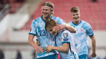 Norway&#039;s defender Jonas Svensson (R) celebrates his goal with forward Erling Braut Haaland during the FIFA World Cup Qatar 2022 qualification football match between Gibraltar and Norway on March 24, 2021 at the Victoria Stadium in Gibraltar. (Photo b