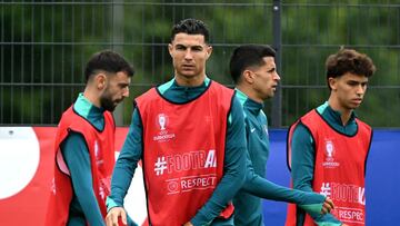 (From L) Portugal's midfielder #10 Bernardo Silva, Portugal's midfielder #08 Bruno Fernandes, Portugal's forward #07 Cristiano Ronaldo, Portugal's defender #20 Joao Cancelo and Portugal's forward #11 Joao Felix attend a MD-1 training session at the team's base camp in Harsewinkel on July 4, 2024, during the UEFA Euro 2024 football championship. (Photo by PATRICIA DE MELO MOREIRA / AFP)