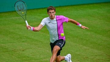 HALLE, GERMANY - JUNE 13: Pablo Carreno Busta of Spain plays a forehand in his match against Holger Rune of Denmark during day three of the 29th Terra Wortmann Open at OWL-Arena on June 13, 2022 in Halle, Germany. (Photo by Thomas F. Starke/Getty Images)