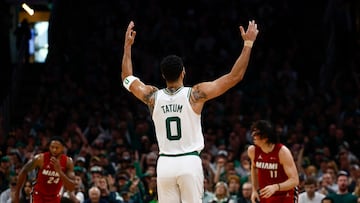 BOSTON, MA - APRIL 21: Jayson Tatum #0 of the Boston Celtics raises his hands after making a three point basket against the Miami Heat during the first quarter of game one of the Eastern Conference First Round Playoffs at TD Garden on April 21, 2024 in Boston, Massachusetts. NOTE TO USER: User expressly acknowledges and agrees that, by downloading and/or using this Photograph, user is consenting to the terms and conditions of the Getty Images License Agreement. (Photo By Winslow Townson/Getty Images) (Photo by Winslow Townson / GETTY IMAGES NORTH AMERICA / Getty Images via AFP)