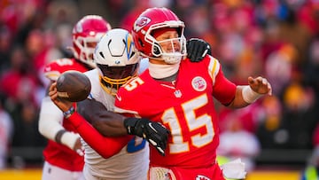 Dec 14, 2025; Kansas City, Missouri, USA; Los Angeles Chargers linebacker Odafe Oweh (98) sacks Kansas City Chiefs quarterback Patrick Mahomes (15) during the second half at GEHA Field at Arrowhead Stadium. Mandatory Credit: Jay Biggerstaff-Imagn Images