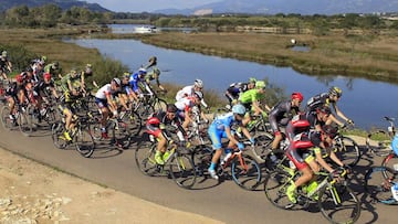 Cyclists compete during the first stage of the 85th International Criterium of Porto Vecchio on March 26, 2016 on the French Mediterranean island of Corsica.