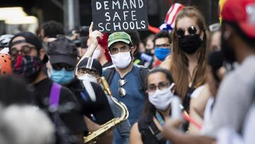 Imagen de una manifestación que se produjo la semana pasada por la reapertura de los coelgios en Estados Unidos.