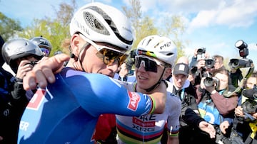 Second-placed Alpecin-Premier Tech's Dutch rider Mathieu van der Poel (L) is congratulated by first-placed UAE Team Emirates' Slovenian rider Tadej Pogacar (R) after competing in the men's race of the 'Ronde van Vlaanderen/ Tour des Flandres/ Tour of Flanders' UCI WorldTour one day cycling race, 278 km from Antwerp to Oudenaarde, in Haaltert on April 5, 2026. (Photo by DAVID PINTENS / Belga / AFP) / Belgium OUT