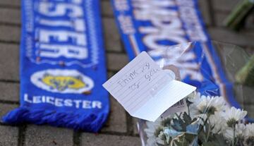 Messages and flowers can be seen placed outside Leicester City football stadium after the helicopter of the club owner Thai businessman Vichai Srivaddhanaprabha crashed when leaving the ground on Saturday evening after the match, in Leicester, Britain, Oc