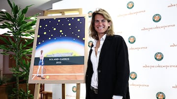 Roland-Garros Open tennis tournament's director Amelie Mauresmo poses next to the Roland-Garros 2023 poster during a press conference presenting the 2023 edition of the Roland Garros Grand Slam tennis tournament at Roland Garros stadium in Paris on April, 2023. (Photo by Anne-Christine POUJOULAT / AFP)