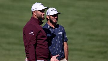 SCOTTSDALE, ARIZONA - FEBRUARY 09: (L-R) Jon Rahm of Spain and Max Homa of the United States stand on the second hole during the first round of the WM Phoenix Open at TPC Scottsdale on February 09, 2023 in Scottsdale, Arizona.   Steph Chambers/Getty Images/AFP (Photo by Steph Chambers / GETTY IMAGES NORTH AMERICA / Getty Images via AFP)