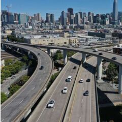 How does the bipartisan infrastructure bill compare to Biden's American Jobs Plan?