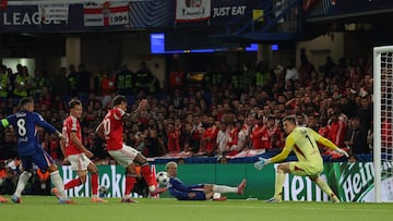 Benfica's Colombian midfielder #20 Richard Rios scores an own goal during the UEFA Champions League, league phase football match between Chelsea and Benfica at Stamford Bridge in London on September 30, 2025. (Photo by Adrian Dennis / AFP)