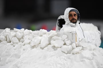 A television cameraman during the 10km biathlon.