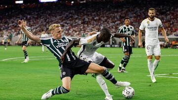 HOUSTON, TEXAS - JULY 26: Freland Mendy #23 of Real Madrid defends a shot by Donny Van De Beek #34 of Manchester United in the second half during the 2023 Soccer Champions Tour match at NRG Stadium on July 26, 2023 in Houston, Texas. Tim Warner/Getty Images/AFP (Photo by Tim Warner / GETTY IMAGES NORTH AMERICA / Getty Images via AFP)
