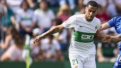 ELCHE, SPAIN - MAY 22: Omar Mascarell of Elche CF competes for the ball with Mauro Arambarri of Getafe CF  during the LaLiga Santander match between Elche CF and Getafe CF at Estadio Manuel Martinez Valero on May 22, 2022 in Elche, Spain. (Photo by Aitor 