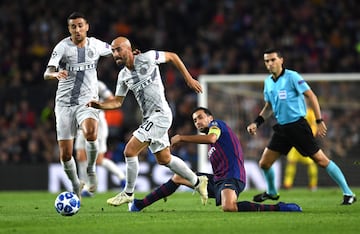  Borja Valero y Sergio Busquets.