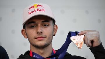 Third placed Spain's Alberto Gines Lopez celebrates with his bronze medal on the podium after winning the men's Lead final climbing event of the European Championships Munich 2022 in Munich, southern Germany on August 14, 2022. (Photo by Tobias SCHWARZ / AFP)