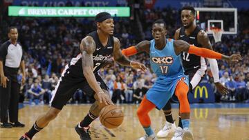 Jan 6, 2019; Oklahoma City, OK, USA; Washington Wizards guard Bradley Beal (3) drives to the basket around Oklahoma City Thunder guard Dennis Schroder (17) during the first half at Chesapeake Energy Arena. Mandatory Credit: Alonzo Adams-USA TODAY Sports