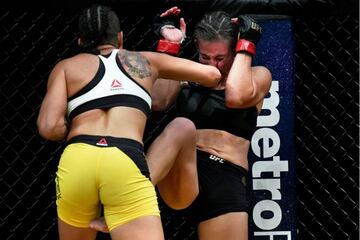 Amanda Nunes brutaliza a Miesha Tate en su camino hasta la conquista del cinturón de los gallos del UFC.