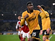 Wolverhampton Wanderers' Colombian defender #15 Yerson Mosquera reacts during the English Premier League football match between Wolverhampton Wanderers and Arsenal at the Molineux stadium in Wolverhampton, central England on February 18, 2026. (Photo by Paul ELLIS / AFP) / RESTRICTED TO EDITORIAL USE. No use with unauthorized audio, video, data, fixture lists, club/league logos or 'live' services. Online in-match use limited to 120 images. An additional 40 images may be used in extra time. No video emulation. Social media in-match use limited to 120 images. An additional 40 images may be used in extra time. No use in betting publications, games or single club/league/player publications. /