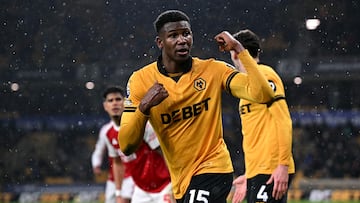 Wolverhampton Wanderers' Colombian defender #15 Yerson Mosquera reacts during the English Premier League football match between Wolverhampton Wanderers and Arsenal at the Molineux stadium in Wolverhampton, central England on February 18, 2026. (Photo by Paul ELLIS / AFP) / RESTRICTED TO EDITORIAL USE. No use with unauthorized audio, video, data, fixture lists, club/league logos or 'live' services. Online in-match use limited to 120 images. An additional 40 images may be used in extra time. No video emulation. Social media in-match use limited to 120 images. An additional 40 images may be used in extra time. No use in betting publications, games or single club/league/player publications. /