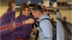Elton John serenaded by Manchester City players at airport