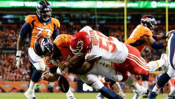 Nov 27, 2016; Denver, CO, USA; Kansas City Chiefs outside linebacker Justin Houston (50) forces a fumble against Denver Broncos quarterback Trevor Siemian (13) in the second quarter at Sports Authority Field at Mile High. Mandatory Credit: Isaiah J. Downing-USA TODAY Sports