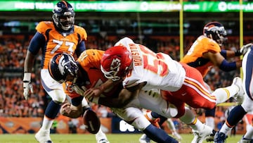 Nov 27, 2016; Denver, CO, USA; Kansas City Chiefs outside linebacker Justin Houston (50) forces a fumble against Denver Broncos quarterback Trevor Siemian (13) in the second quarter at Sports Authority Field at Mile High. Mandatory Credit: Isaiah J. Downing-USA TODAY Sports