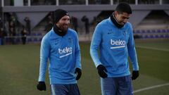 Messi, junto a Su&aacute;rez en el entrenamiento de este martes.