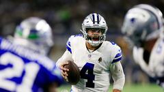 ARLINGTON, TEXAS - NOVEMBER 30: Quarterback Dak Prescott #4 of the Dallas Cowboys scrambles during the 2nd quarter of the game against the Seattle Seahawks at AT&T Stadium on November 30, 2023 in Arlington, Texas.   Ron Jenkins/Getty Images/AFP (Photo by Ron Jenkins / GETTY IMAGES NORTH AMERICA / Getty Images via AFP)