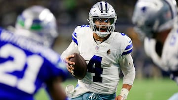ARLINGTON, TEXAS - NOVEMBER 30: Quarterback Dak Prescott #4 of the Dallas Cowboys scrambles during the 2nd quarter of the game against the Seattle Seahawks at AT&T Stadium on November 30, 2023 in Arlington, Texas. Ron Jenkins/Getty Images/AFP (Photo by Ron Jenkins / GETTY IMAGES NORTH AMERICA / Getty Images via AFP)