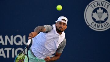 Aug 11, 2022; Montreal, QC, Canada; Nick Kyrgios (AUS) serves against Alex De Minaur (AUS) (not pictured) in third round play in the National Bank Open at IGA Stadium. Mandatory Credit: Eric Bolte-USA TODAY Sports