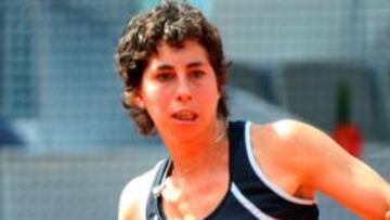 <b>ELIMINADA.</b> La española Carla Suárez cayó hoy ante la china Na Li por 5-7, 6-1 y 7-5 en la primera ronda del Masters 1000 de Madrid.