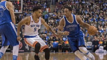 Nov 12, 2016; Toronto, Ontario, CAN; Toronto Raptors guard DeMar DeRozan (10) dribbles the ball as New York Knicks guard Courtney Lee (5) defends during the third quarter in a game at Air Canada Centre. The Toronto Raptors won 118-107. Mandatory Credit: Nick Turchiaro-USA TODAY Sports