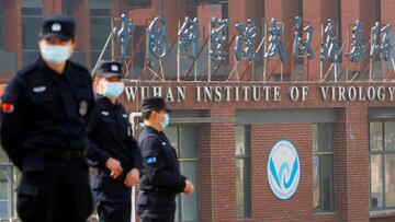 Security personnel keep watch outside the Wuhan Institute of Virology during the visit by the World Health Organization (WHO) team tasked with investigating the origins of the coronavirus disease (COVID-19), in&nbsp;Wuhan, Hubei province, China February 3