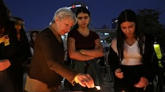 Violet Turgeman, of Ramat Gan, lights a candle, after the truce between Israel and Hamas started today, in Tel Aviv, Israel November 24, 2023. REUTERS/Nathan Frandino