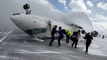 Passengers leave a Delta Air Lines CRJ-900 jet after it crashed on landing at Toronto Pearson International Airport in Mississauga, Ontario, Canada February 17, 2025 in a still image from video. Peter Koukov/Handout via REUTERS THIS IMAGE HAS BEEN SUPPLIED BY A THIRD PARTY