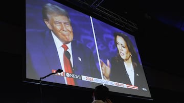 A screen displays the presidential debate hosted by ABC between Republican presidential nominee, former U.S. President Donald Trump and Democratic presidential nominee, U.S. Vice President Kamala Harris in Philadelphia, Pennsylvania, U.S., September 10, 2024. REUTERS/Evelyn Hockstein