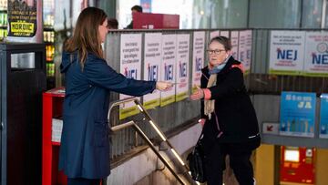 Political spokeswoman of The Red-Green Alliance Mai Villadsen (L) hands out flyers during her party&#039;s &quot;NO&quot; campaign at Noerreport Station in Copenhagen, Denmark, on May 31, 2022. - After 30 years of staying outside of European Union defence