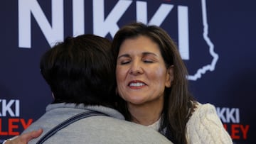 FILE PHOTO: Republican presidential candidate and former U.S. Ambassador to the United Nations Nikki Haley hugs an audience member at a Get Out the Vote campaign rally ahead of the New Hampshire primary election in Derry, New Hampshire, U.S., January 21, 2024.   REUTERS/Brian Snyder/File Photo