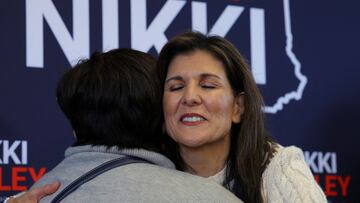 FILE PHOTO: Republican presidential candidate and former U.S. Ambassador to the United Nations Nikki Haley hugs an audience member at a Get Out the Vote campaign rally ahead of the New Hampshire primary election in Derry, New Hampshire, U.S., January 21, 2024.   REUTERS/Brian Snyder/File Photo