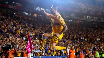 Tigres' French forward Andre Pierre Gignac celebrates after scoring against Pachuca during their Mexican Apertura tournament football match between Tigres And Pachuca at Universitario stadium in Monterrey, Mexico, on October 13, 2022. (Photo by Julio Cesar AGUILAR / AFP)