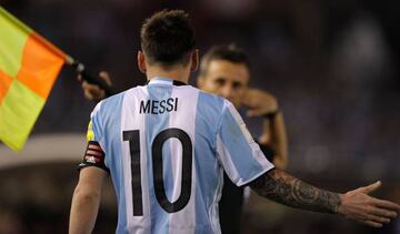 Messi having a word with the assistant during the game against Chile.