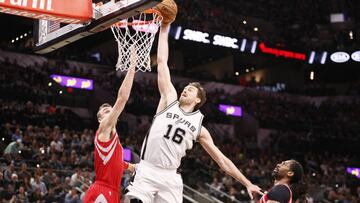 Mar 6, 2017; San Antonio, TX, USA; San Antonio Spurs center Pau Gasol (16) dunks the ball over Houston Rockets small forward Sam Dekker (left) during the first half at AT&amp;T Center. Mandatory Credit: Soobum Im-USA TODAY Sports