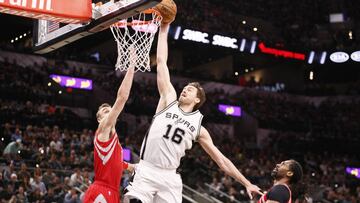 Mar 6, 2017; San Antonio, TX, USA; San Antonio Spurs center Pau Gasol (16) dunks the ball over Houston Rockets small forward Sam Dekker (left) during the first half at AT&amp;T Center. Mandatory Credit: Soobum Im-USA TODAY Sports